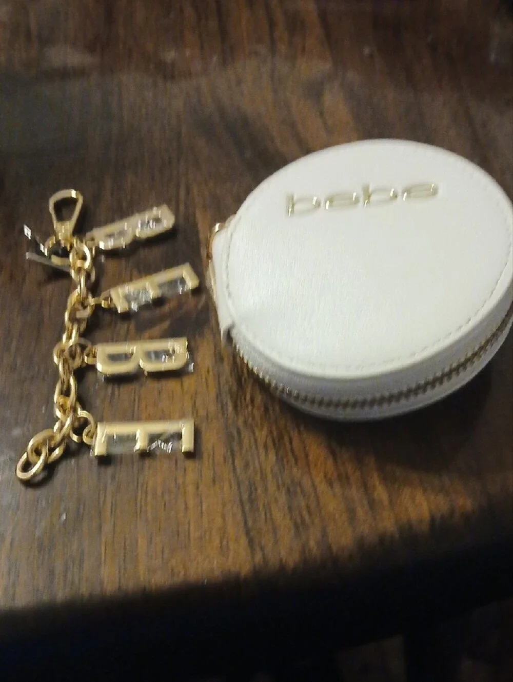 bebe White Round Zip Coin Pouch with Gold Logo  Charm Key Chain
